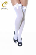 White Holds Up Stockings with White Bow